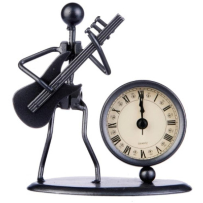 980706 Skulptur mit Uhr Gitarre